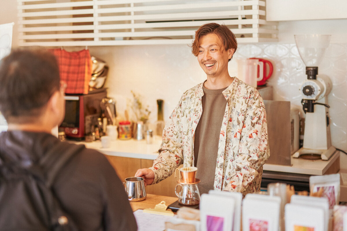 Serving customers at specialty coffee shop Hoshikawa Cafe in Japan